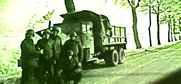 Image: 188th ECB, 'C' Company squad members with truck on N4 south of Bastogne